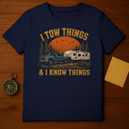 T-shirt with "I TOW THINGS & I KNOW THINGS" text and camper scene.