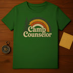 Green t-shirt with distressed "Camp Counselor" text and retro rainbow graphic.