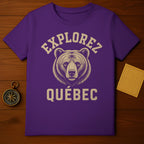 Purple t-shirt with bear graphic and "Explorez Québec" text.