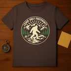 Sasquatch Leave Only Footprints Mountain Adventure product type
Bigfoot
Sasquatch
Nature
Outdoors
Wilderness
Forest
Mountains
Hiking
Camping
Adventure
Cryptid
Mythical Creature
Leave Only Footprints
Eco Friendly
Conservation
Graphic Tee
Apparel
Brown Shirt
Outdoor Enthusiast
Bigfoot Lover