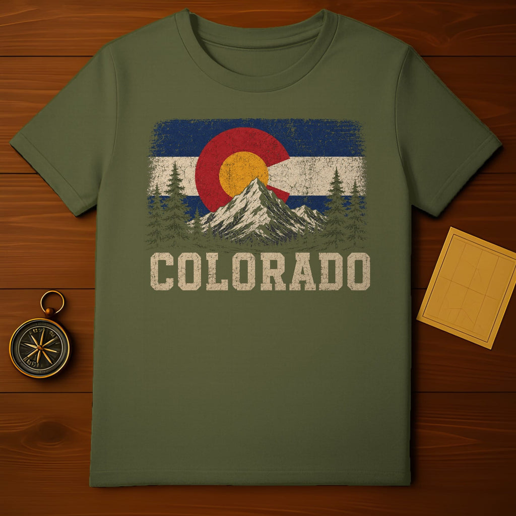 T-shirt with distressed Colorado flag, mountains, trees, and text.