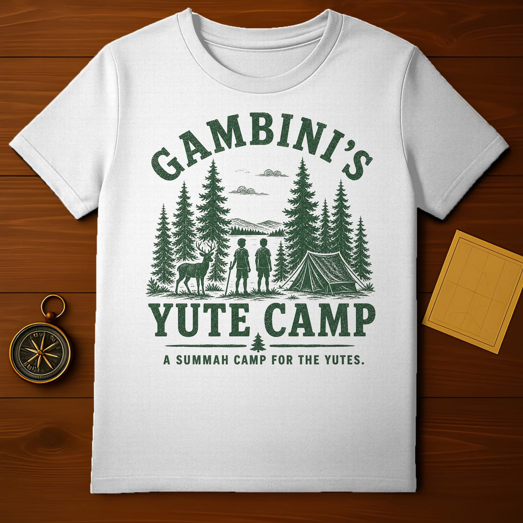 White t-shirt with "GAMBINI'S YUTE CAMP" and trees/tent graphic.