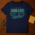 Dark navy t-shirt with "Vintage Van Life Live Free" text and laurel design.