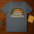 Dark grey t-shirt with "Camp Counselor" text, tree, and a retro rainbow.