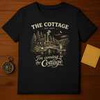 Black t-shirt with "The Cottage Est. 2017" and cabin scene.