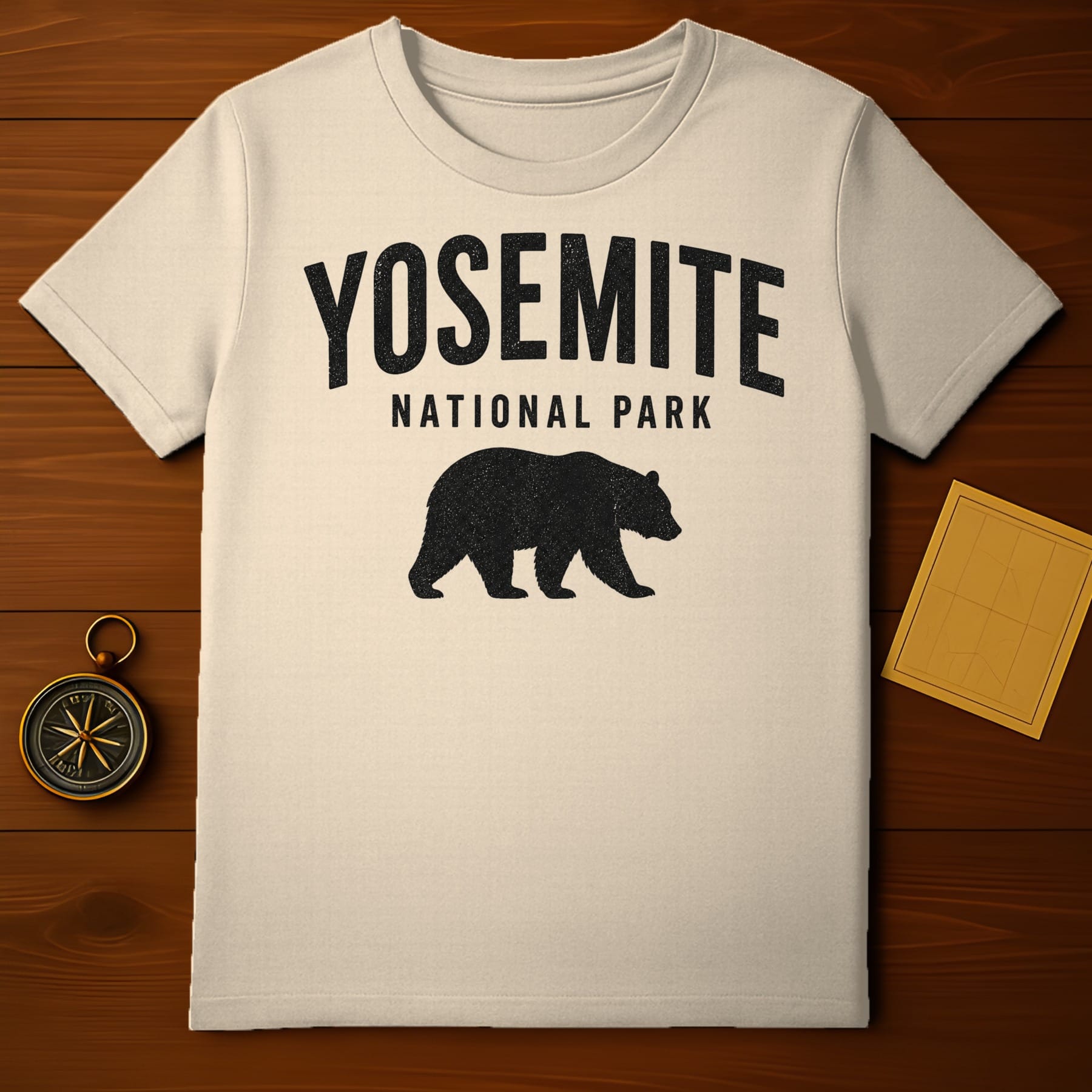 Cream t-shirt with "Yosemite National Park" and a bear silhouette.