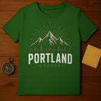 Green t-shirt with "PORTLAND OREGON" and mountain graphic.