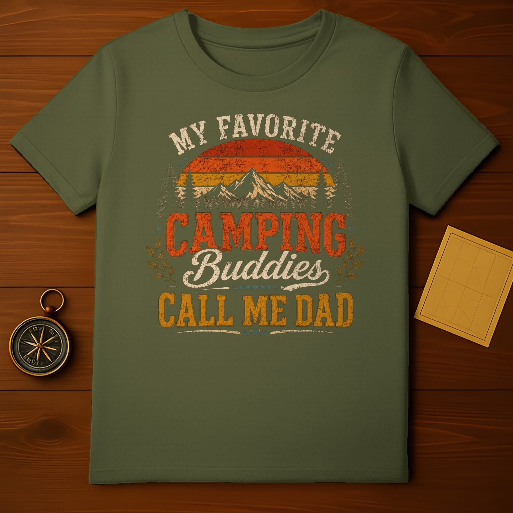 Olive green t-shirt with "My Favorite Camping Buddies Call Me Dad" text.