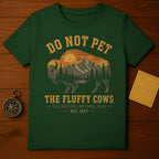 Green t-shirt with "Do Not Pet The Fluffy Cows Yellowstone National Park 1872" text and bison silhouette.