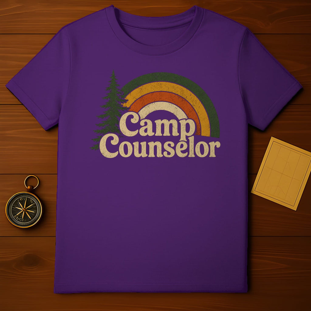 Purple t-shirt with retro rainbow and "Camp Counselor" text.