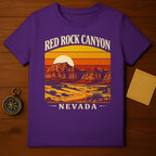 RED ROCK CANYON NEVADA Desert Landscape Graphic T-Shirt product type
red rock canyon, nevada, desert landscape, mountain graphic, sunrise sunset, purple apparel, nature design, outdoor theme, travel souvenir, retro graphic, southwest art, canyon vista, desert flora, scenic design, road trip, national park, adventure style, vintage look, vibrant colors, western desert