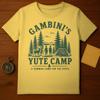 Yellow t-shirt with "Gambini's Yute Camp" text and forest graphic.