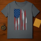 T-shirt with distressed American flag pattern superimposed on pine trees.