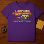 Purple t-shirt with "I'm a camping mom like a normal mom only much cooler" graphic.