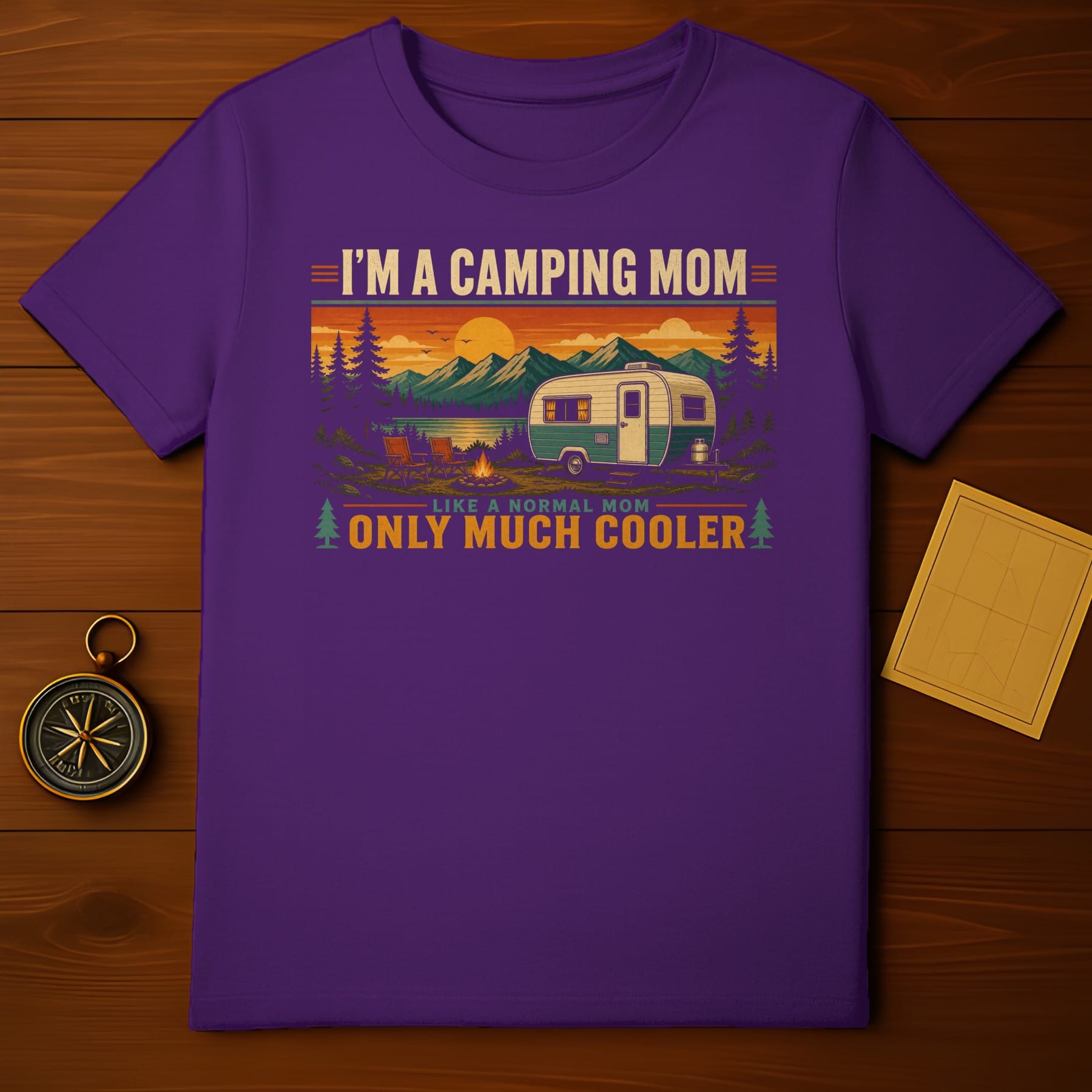 Purple t-shirt with "I'm a camping mom like a normal mom only much cooler" graphic.